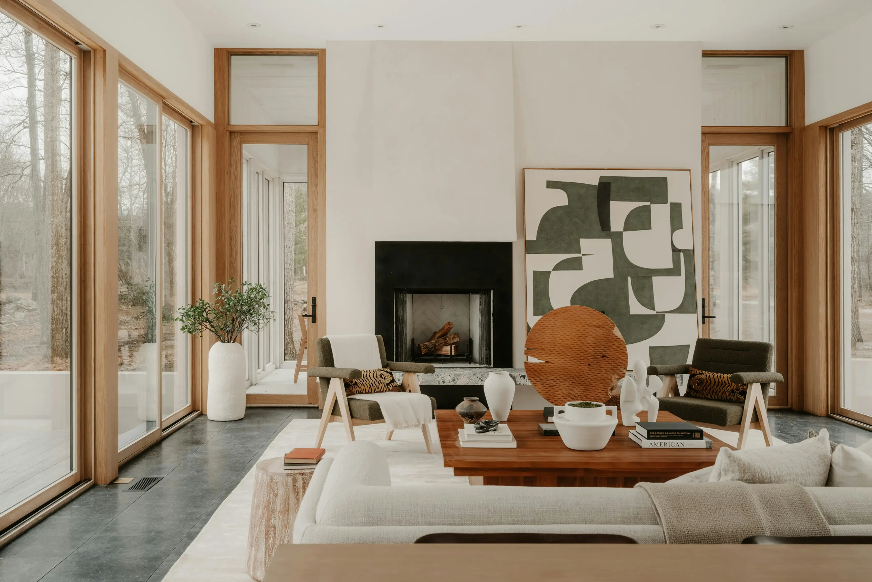 Sunlit living room with natural wood details and uncluttered furnishings